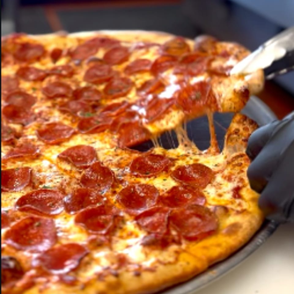 Fresh pizza at The Pizza Store Laguna Hills