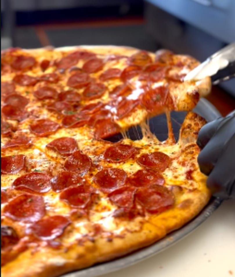 Fresh pizza at The Pizza Store Laguna Hills
